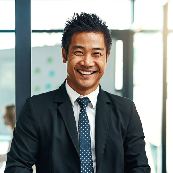 smiling man in suit