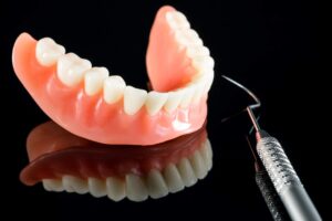 Removable traditional dentures at Creve Coeur Dental in Creve Coeur, MO, for tooth replacement.